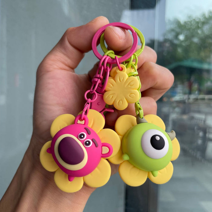 Wholesale Rotating keychain, cute doll bag pendant, hanging decoration, car keychain, smiling face style