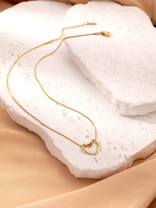 Wholesale Stainless Steel Clavicle Chain Necklace — Asymmetrical Design featuring a Bowknot  Rhinestone Accents  and Heart Pendant