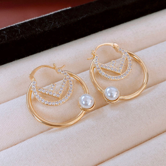 Wholesale Silver needle zircon round artificial pearl earrings high-end luxury retro earrings unique French design earrings