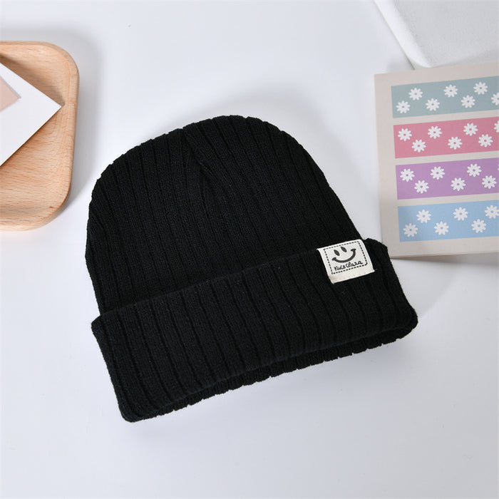 Wholesale Casual, fashionable, warm knit hat, cute smiling face pullover hat