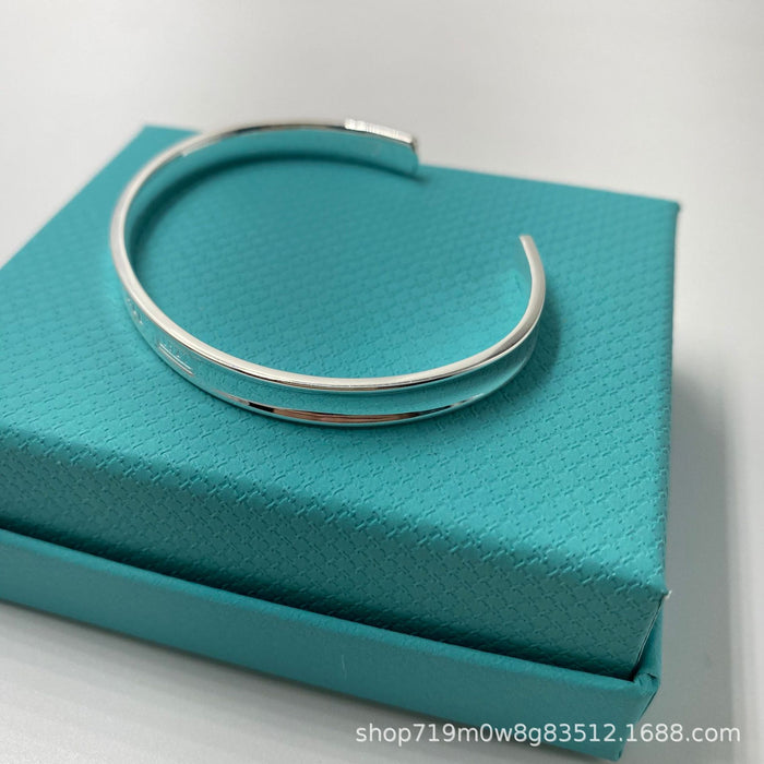 Wholesale Classic open mouth couple bracelet, fashionable concave steel seal letter wide version bracelet