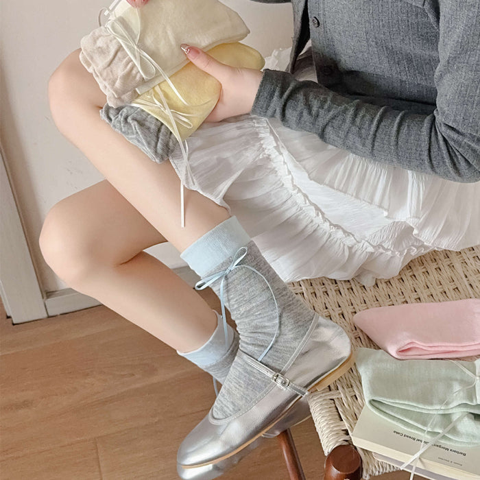 Wholesale Butterfly knot pile socks, cute and versatile pile socks