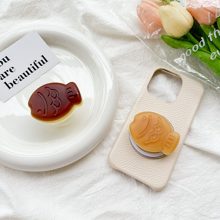 Wholesale Three-dimensional frosted fish mobile phone stand