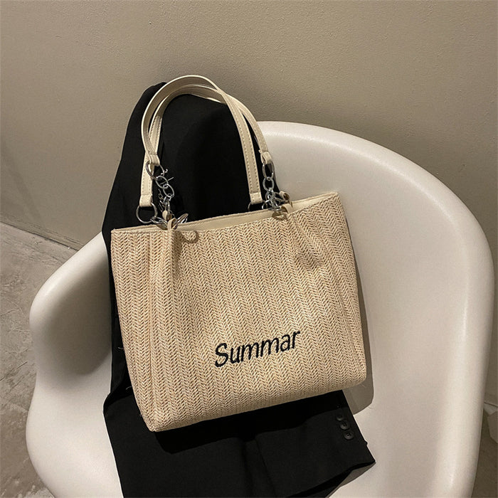 Wholesale Large capacity fashionable woven letter tote bag, trendy casual commuting shoulder bag