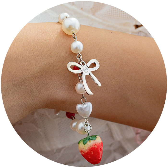 Wholesale Strawberry Bow Pearl Zinc Alloy Bracelet JDC-BT-DaoNi001