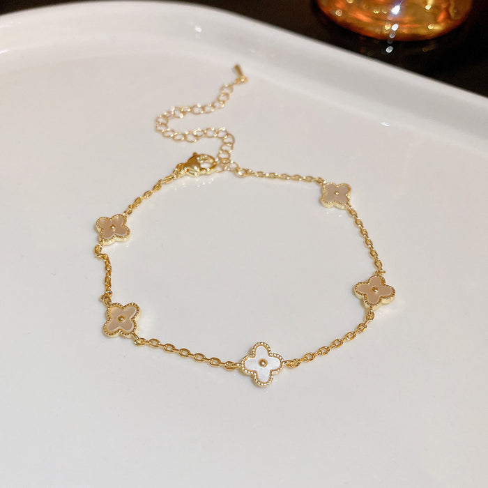 Wholesale Real Gold Electroplated Zircon Four-petal Flower Imitation Fritillaria Bracelet Light Luxury High-end Sense Bracelet Sweet All-match Bracelet Wholesale Women