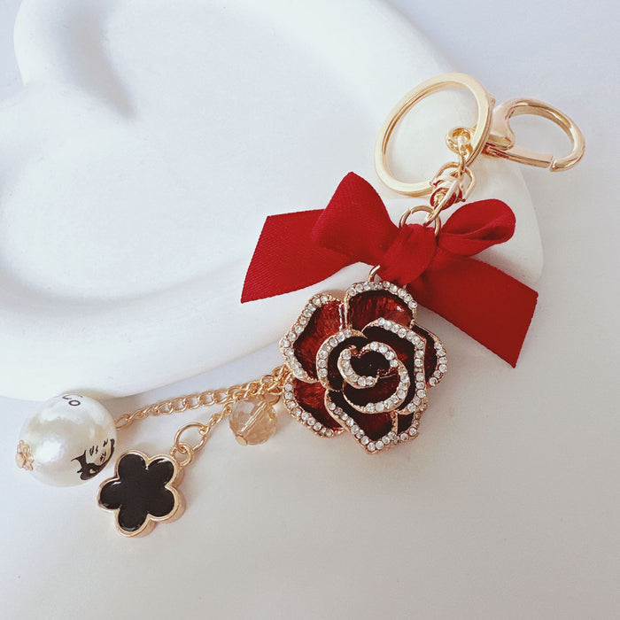 Wholesale Rhinestone Bow Pearl Tassel Camellia Zinc Alloy Keychain JDC-KC-ZhanLun014