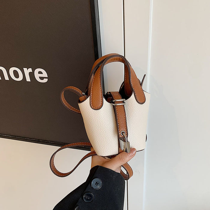 Wholesale Children's bag, high-end color blocked mini bucket bag, hand-held bucket bag, crossbody bag