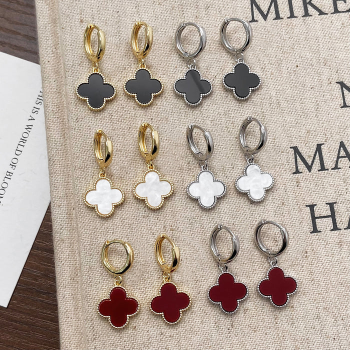 Wholesale Simple lucky flower gold plated earrings