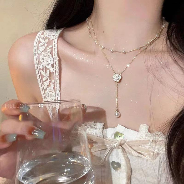 Wholesale Double layered tassel pearl necklace, niche design pendant, collarbone chain, high-end temperament, neck chain