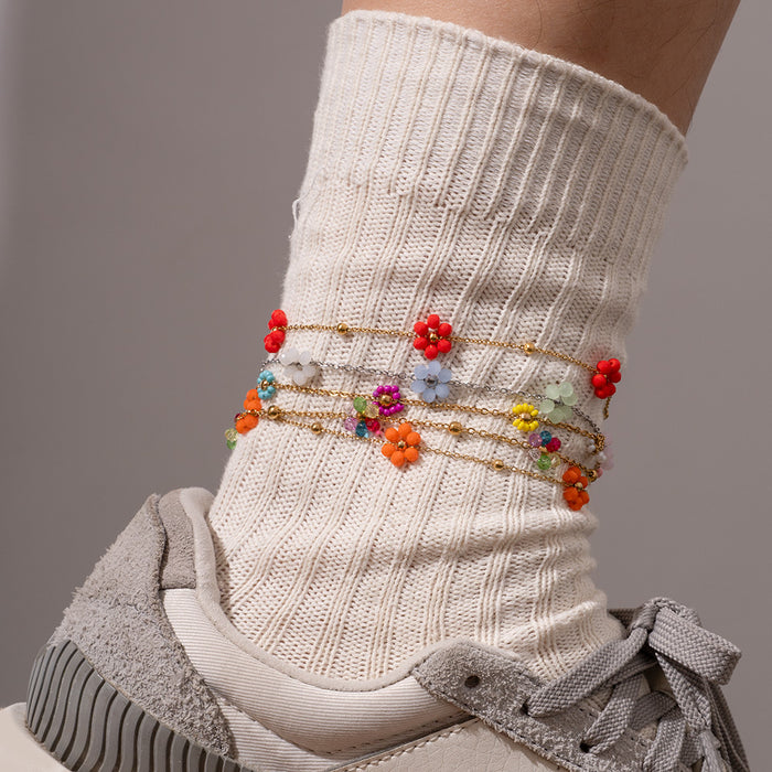 Wholesale Fashionable stainless steel flower ankle chain, colorful temperament, colorful foot accessories, color preservation wholesale