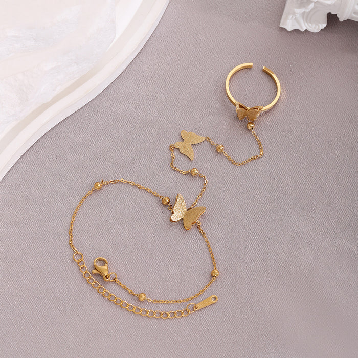 Wholesale Fashion girl bracelet with frosted butterfly titanium steel beads, adjustable opening ring, finger chain