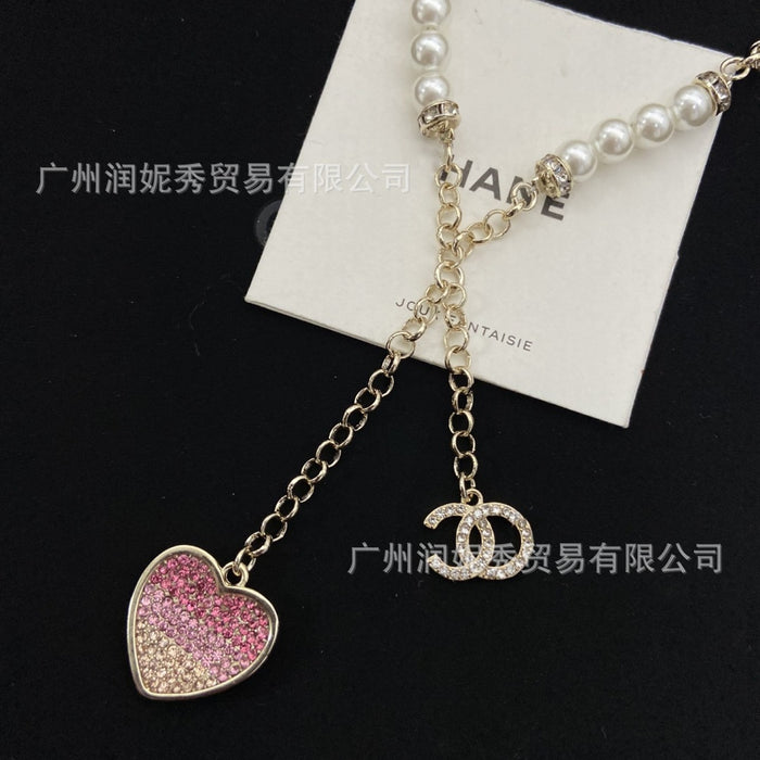 Wholesale Gradient tassel heart-shaped pearl necklace, pink diamond heart-shaped collarbone chain