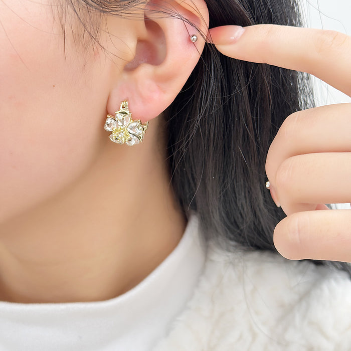 Wholesale Fashionable temperament, high-end earrings, light luxury, super fairy earrings, cat eye stones, double-sided flower ear buckles