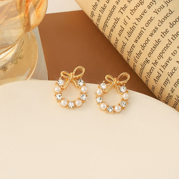 Wholesale Alloy Bow Pearl Diamond Earrings JDC-ES-MYY007