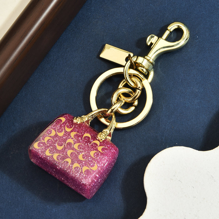 Wholesale Chic Letter C Bag Charm Keychain Red Alloy Electroplated Women S Purse Pendant Gift Resale