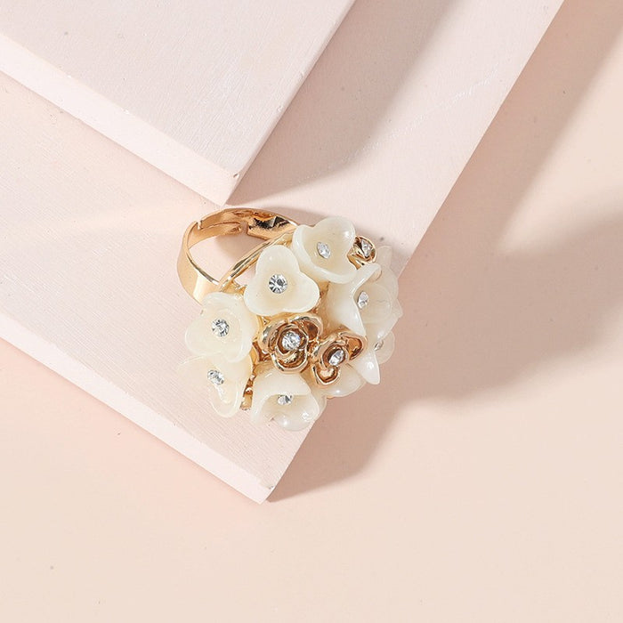 Wholesale fashion jewelry diamond-embedded small flower open ring