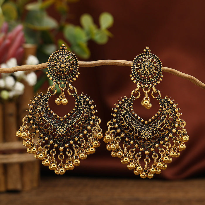 Wholesale Retro Bohemian ethnic style earrings for women exaggerated temperament hollow heart earrings long bell India