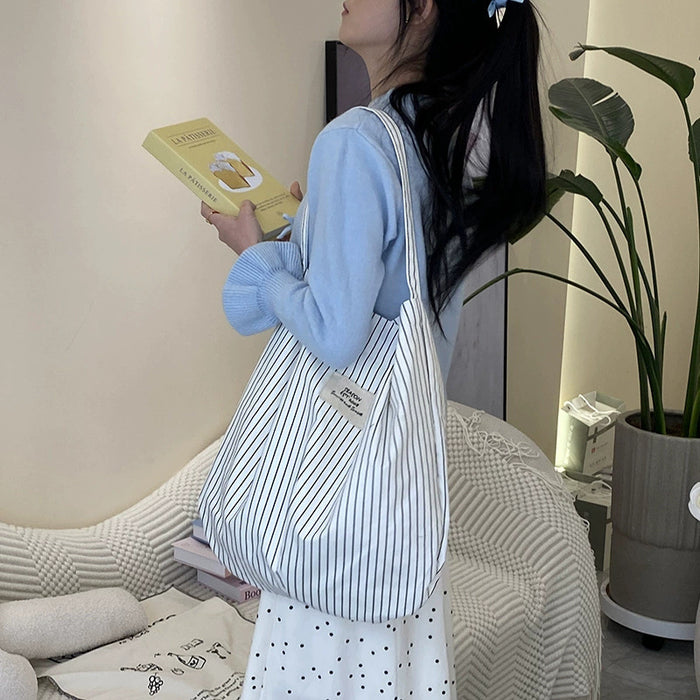 Wholesale Splicing striped canvas bag with simple temperament and large capacity commuting shoulder bag