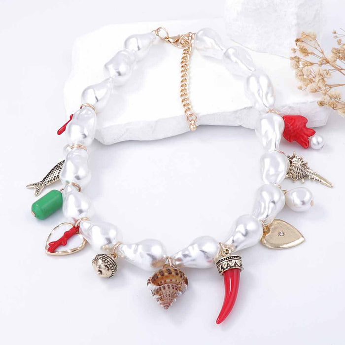 Wholesale imitation pearl alloy love ceramic small fish conch women's necklace