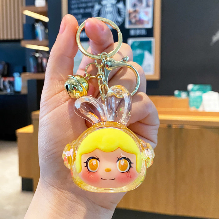 Wholesale Oil-flow sand earphone rabbit keychain