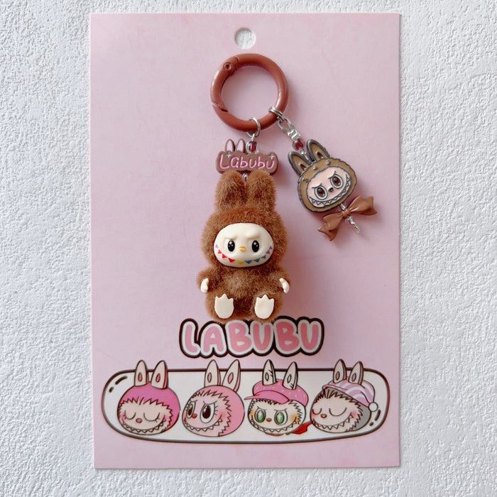 Wholesale Doll Enamel Sitting Posture Cute Mobile Phone Pendant Keychain