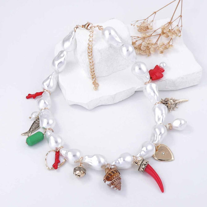 Wholesale imitation pearl alloy love ceramic small fish conch women's necklace