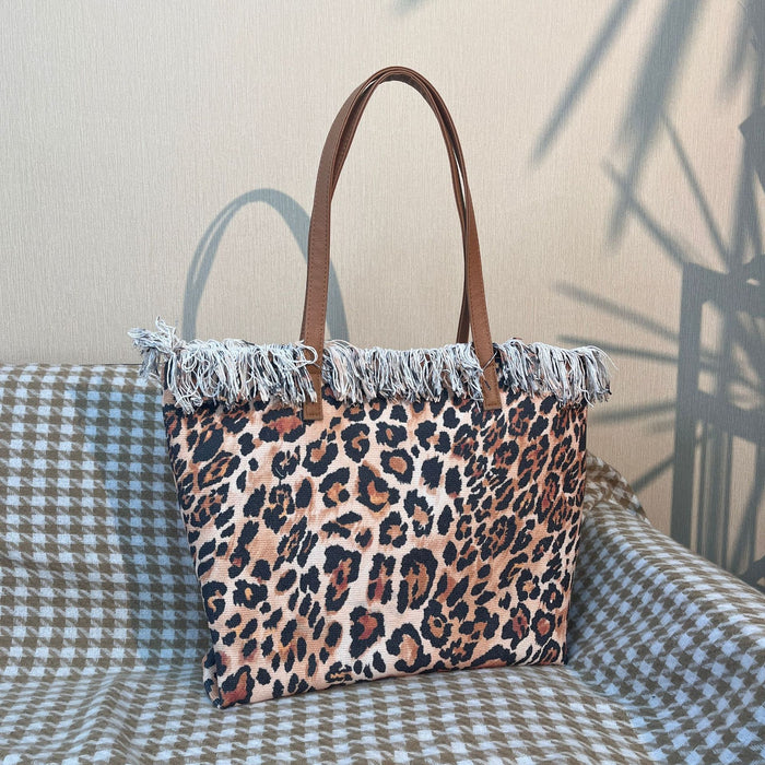 Wholesale New tassel leopard print shoulder bag, large capacity, versatile, fashionable with zipper bag, beach bag, women's tote bag