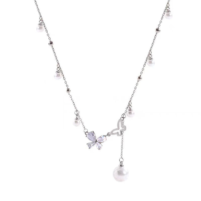 Wholesale Titanium steel non-fading zircon hollow butterfly necklace French pearl tassel clavicle chain high-end luxury accessories