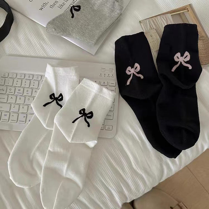 Wholesale Grey bow middle tube socks, pure cotton heel long tube pile socks