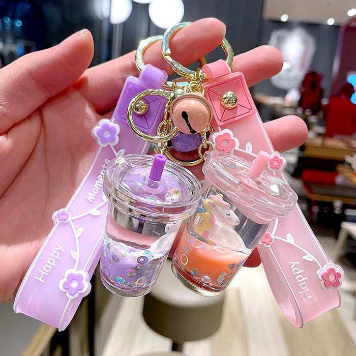 Wholesale Cute milk tea cup unicorn oil quicksand key chain rainbow horse bag hanging ornaments grab baby machine small gifts