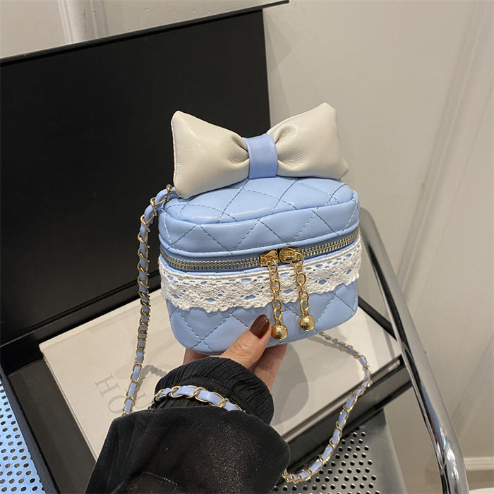 Wholesale Children's bag bow bucket bag cute contrasting color girl chain crossbody bag
