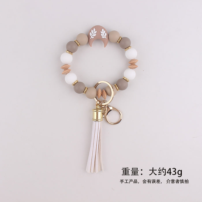 Wholesale Silicone moon beads bag key bracelet bracelet silicone beads beech wood beads tassel keychain