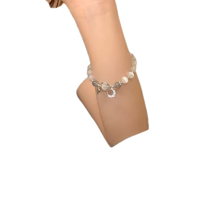 Wholesale Moonstone cat' s eye bracelet with bell pendant
