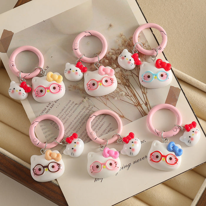 Wholesale Cartoon Cat With Bow And Glasses Resin Keychain Pendant Chic Decorative Accessory