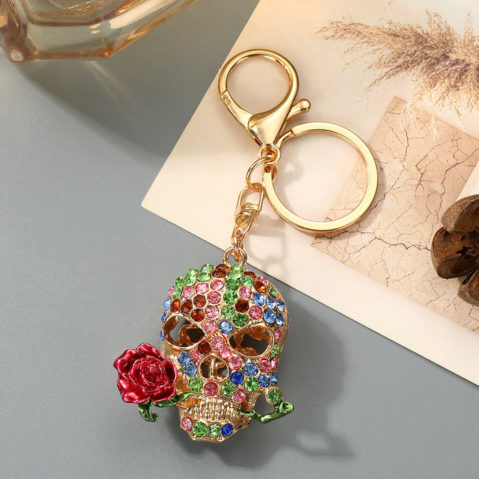 Wholesale Trendy Rhinestone Skull Keychain with Zinc Alloy Bag Charm