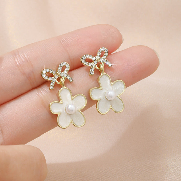 Wholesale Elegant pearl earrings, light luxury, niche, high-end feeling, earrings, butterfly bow flower earrings