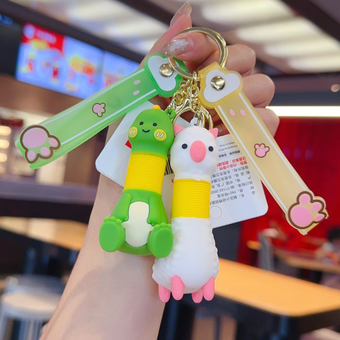 Wholesale Retractable animal pendant PVC doll keychain