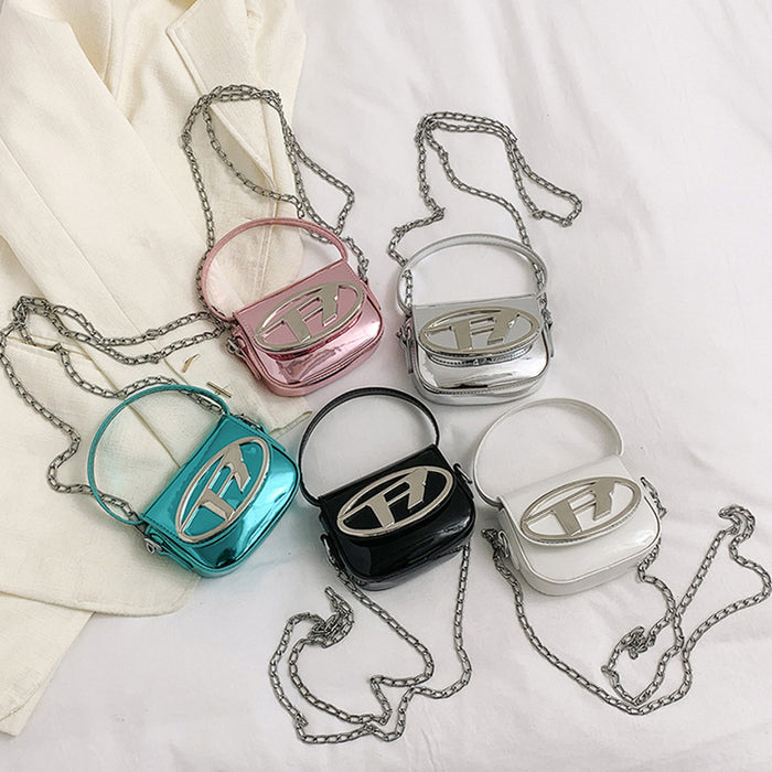 Wholesale New children's bag with glossy patent leather mini saddle bag, stylish women's chain crossbody bag, red envelope at the mouth