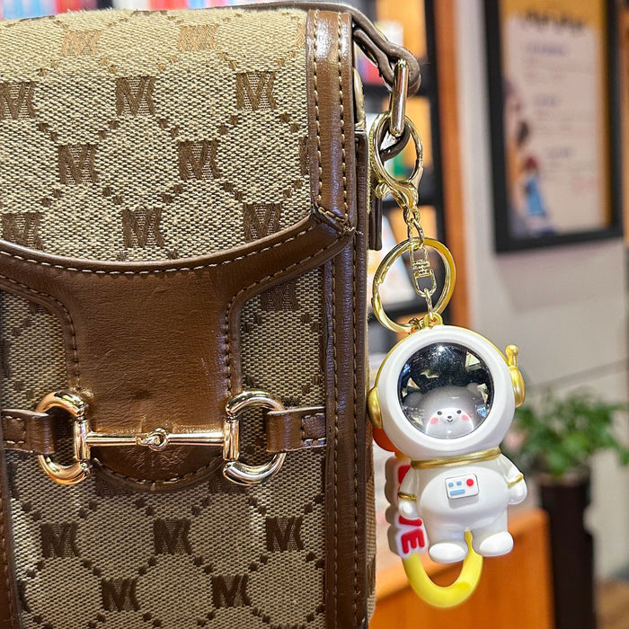 Wholesale Night light astronaut keychain romantic starry sky cute cartoon couple student backpack pendant