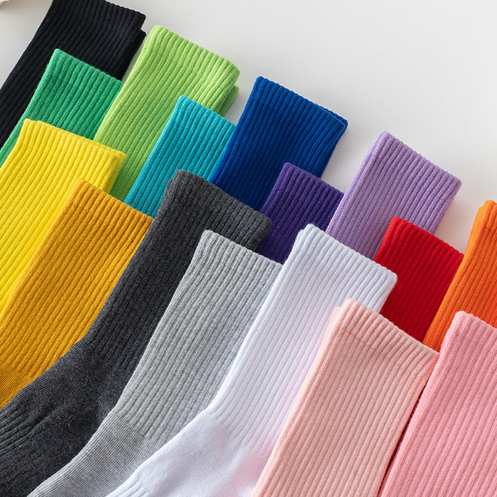 Wholesale Solid color high elastic looped socks for men and women, long socks for sports, cotton socks