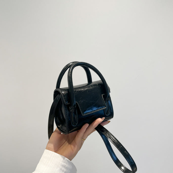 Wholesale New retro oil leather handbag for children, stylish mini parent-child crossbody bag