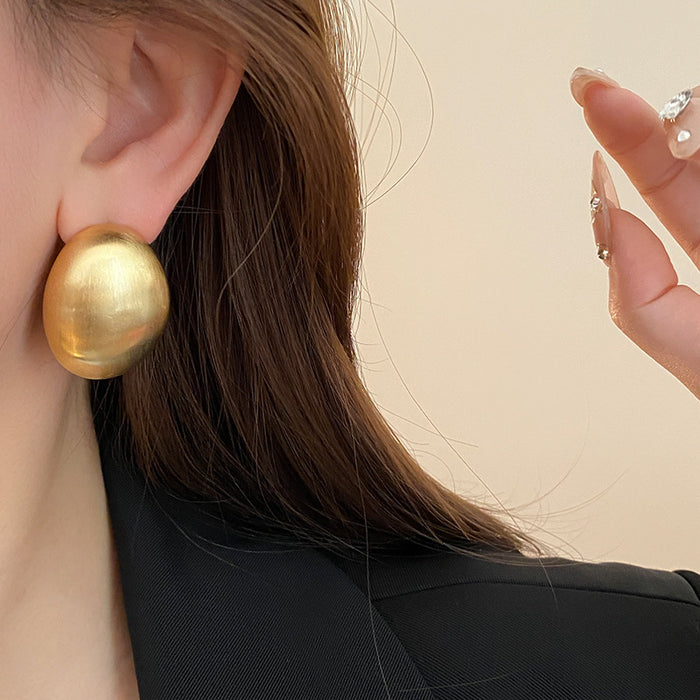 Wholesale Metal brushed earrings exaggerated temperament eardrop gold curved female earrings
