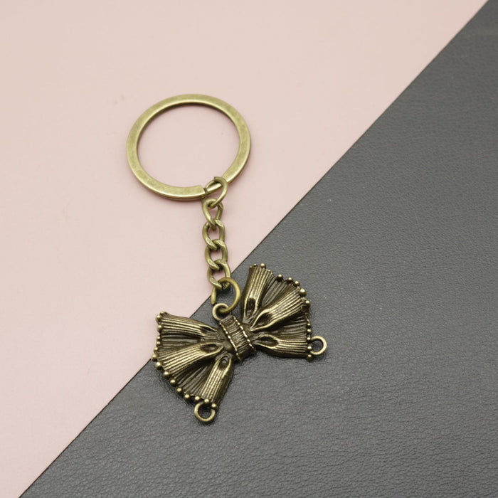 Wholesale Iron Alloy Simple Bow Keychain JDC-KC-HEMS003