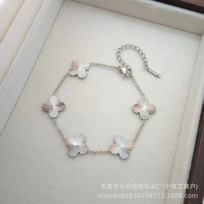 Wholesale Flower and Heart Titanium Steel Bracelet