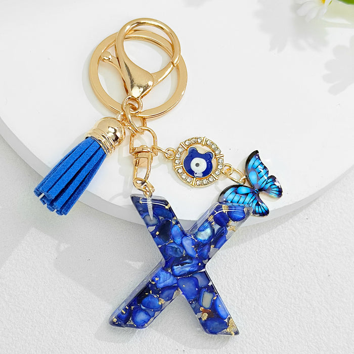 Wholesale Royal Blue 26 Letter Keychain with Evil Eye Butterfly Tassel Pendant