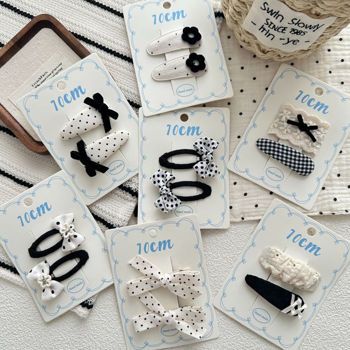 Wholesale Sweet bow hair clip with water droplets, wavy dots, children's fabric, side broken hair, wavy dots, bangs clip