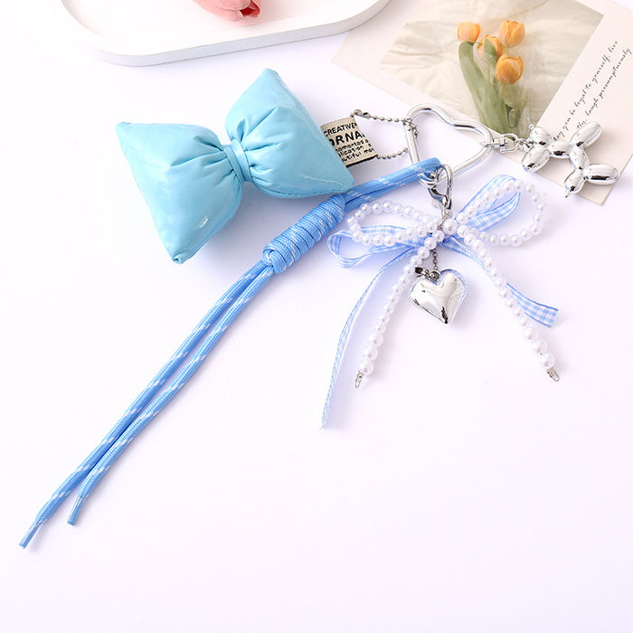Wholesale Leather bow heart pendant luggage keychain lanyard accessories single buckle tassel pendant accessories