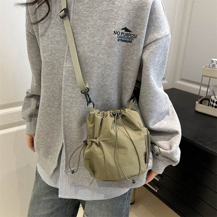 Wholesale Small niche design drawstring bucket bag, outdoor sports, leisure, fashion, versatile nylon crossbody bag