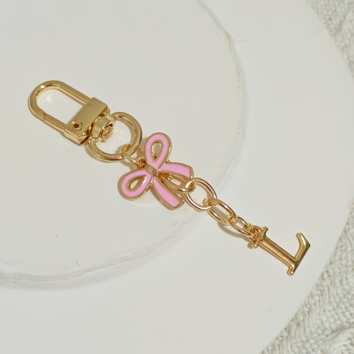 Wholesale Pink bow A-Z keychain alloy accessory